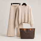 Luxury Beige Knit Sweater and Wide Leg Pants Set Styled with a Louis Vuitton Monogram Neverfull GM